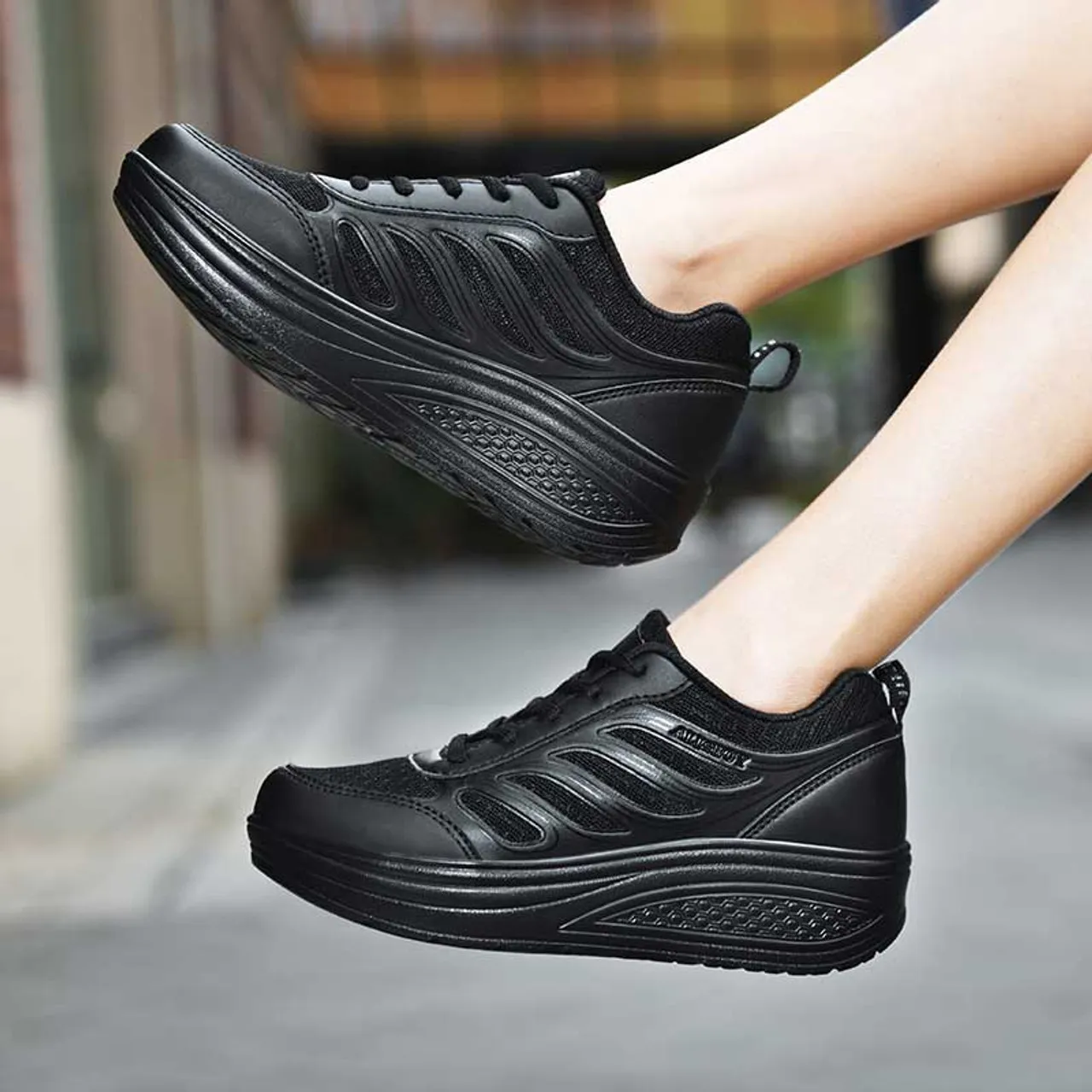 Black flame pattern accents rocker bottom shoe sneaker