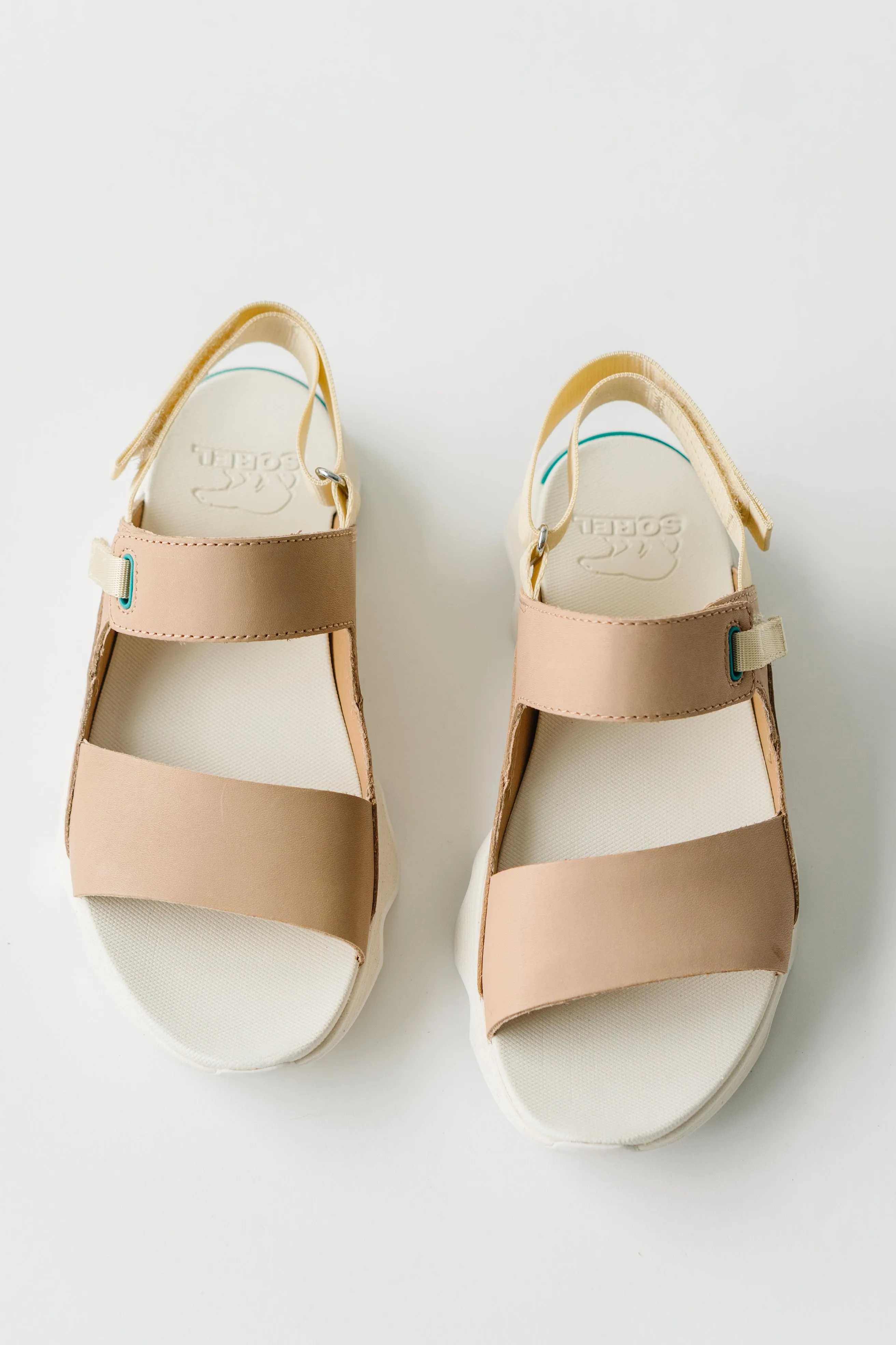 SOREL: Kinetic Impact II Sling Low Sandal in Honest Beige + Sea Salt